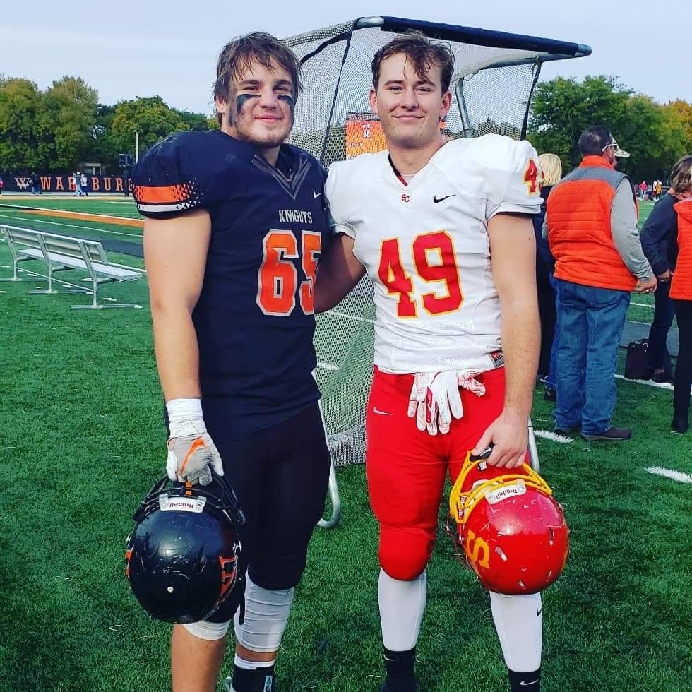 WaukeeFB's tweet photo. A reunion of two #WaukeeFB alumni who played against each other over the weekend. @Jacob_martin25 for @WartburgFB and @RomdallCole for @scstormfootball #GoWaukee https://t.co/fOX4qnybtt