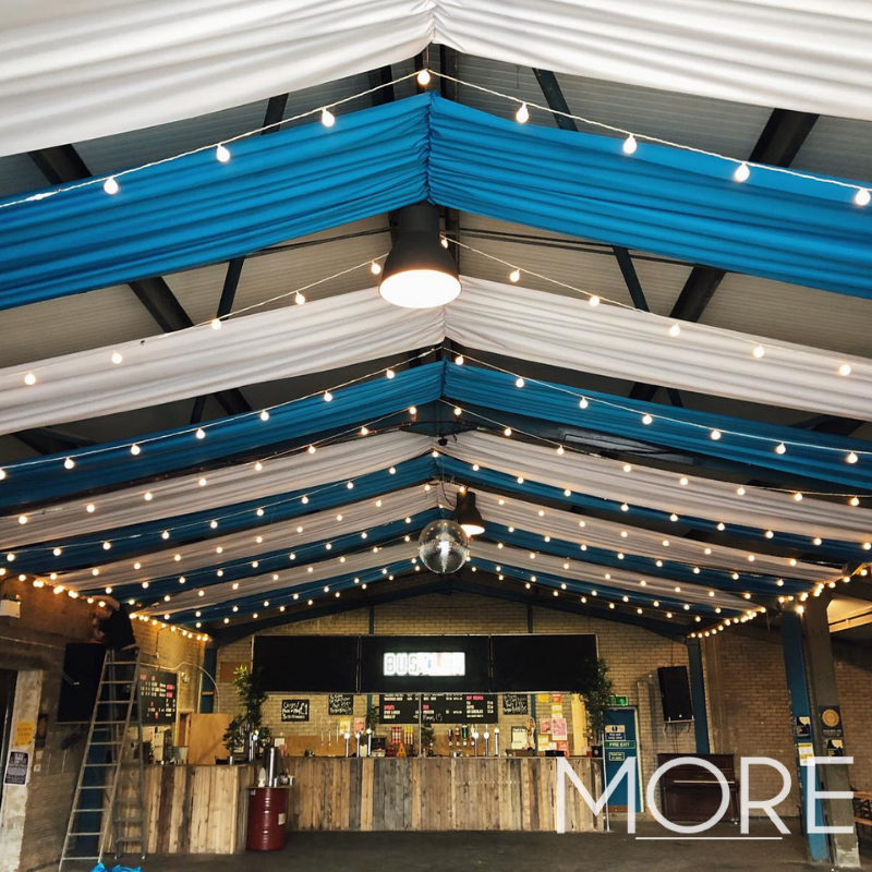 More_Production's tweet photo. We're getting into the Oktoberfest spirit with this recent drape and festoon combo at @bustlermarket! 🍺
@Champs_events
#eventprofs #corporateevents #bespokeevents #events #moreproduction #eventinspo #eventhire #eventproduction #themedevents #oktoberfest #ceilingdrape https://t.co/xcG6vuBpCl