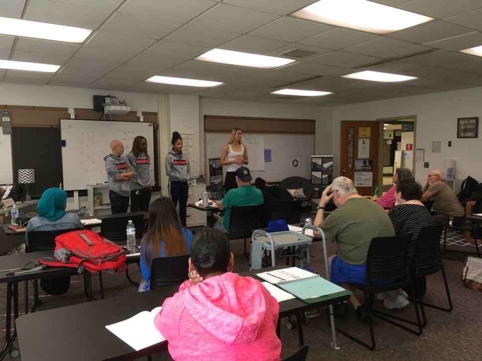 SyracuseSchools's tweet image. Inspired by @Tianamanga, an Adult Education class at @Lincoln_SCSD recently enjoyed a visit from members of the @CuseWBB team. The class read Tiana&apos;s story in @SyrWomanMag &amp;amp; then wrote their own essays about overcoming challenges in their lives. #SCSDPride