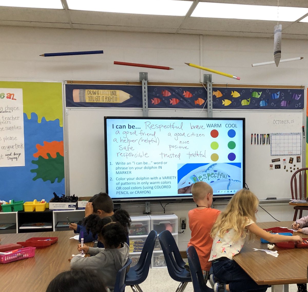 artwalkervb's tweet photo. Second graders brainstorming a list of positive things we can do to be a good friend and citizen (in response to October being Anti-Bullying Month). We made dolphins to hang all over the school with our words using patterns and warm/cool colors! #CESart @CentervilleVB https://t.co/23iEHzpXVk