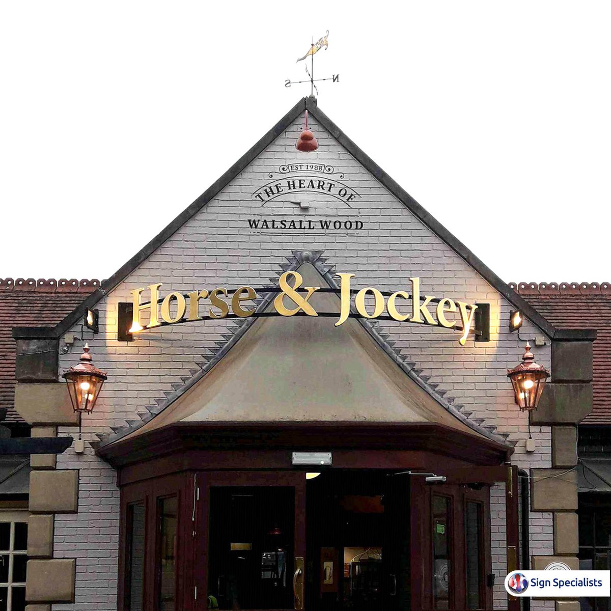 For Horse &amp; Jockey we have combined traditional sign writing in the building apex with individual cut letters for the house name. The additional lanterns either side of the doorway also help illuminate the entrance come dawn as well as lighting up the primary signage. #signage