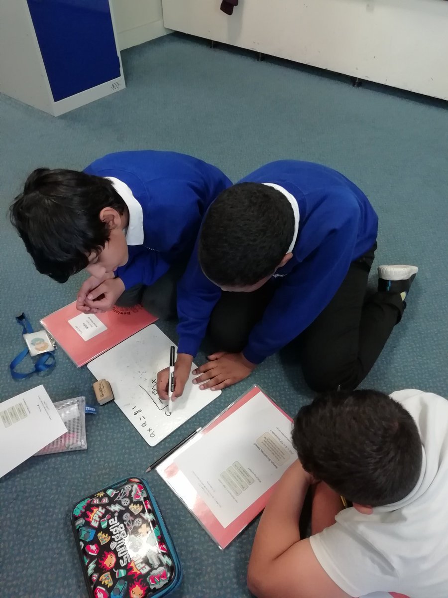 Rowlatts_TMET's tweet photo. Year 5 are working hard at division problem-solving! #rhmaths #resilience #reciprocity https://t.co/COnCQI1sj5