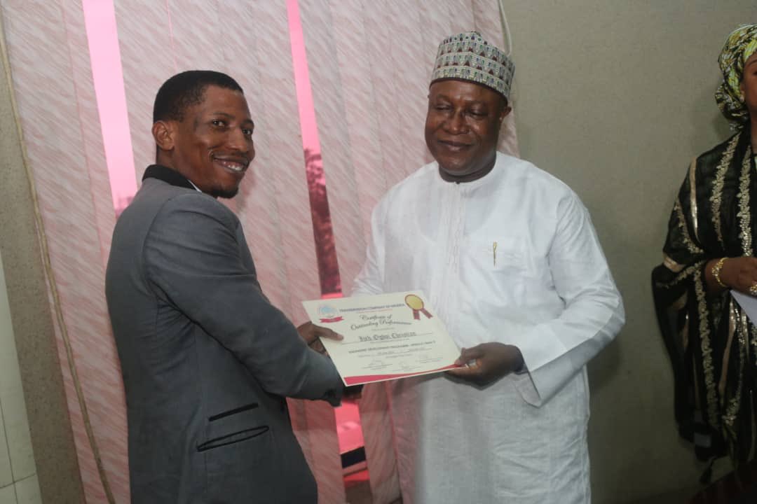TCN_NIGERIA's tweet photo. @TCN_NIGERIA MD/CEO, represented by Head, ISO, Engr MJ Lawal today at TCN HQ in Abuja presented Certificates of Exceptional Performance to the trainee-engineers for their performances during the TCN-ISO Engineers Development Program which was held in Osogbo, Osun State. https://t.co/CfKVhIk59g