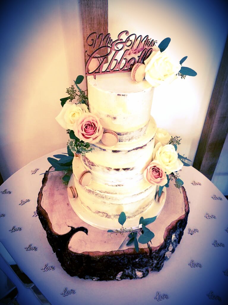 CakeMBSurprise's tweet photo. I still love semi dressed cakes. Throwback to this gorgeous cake finished with macarons for Mr &amp; Mrs Abbot last year. #weddingcakeskent https://t.co/y3yPrcH3U1