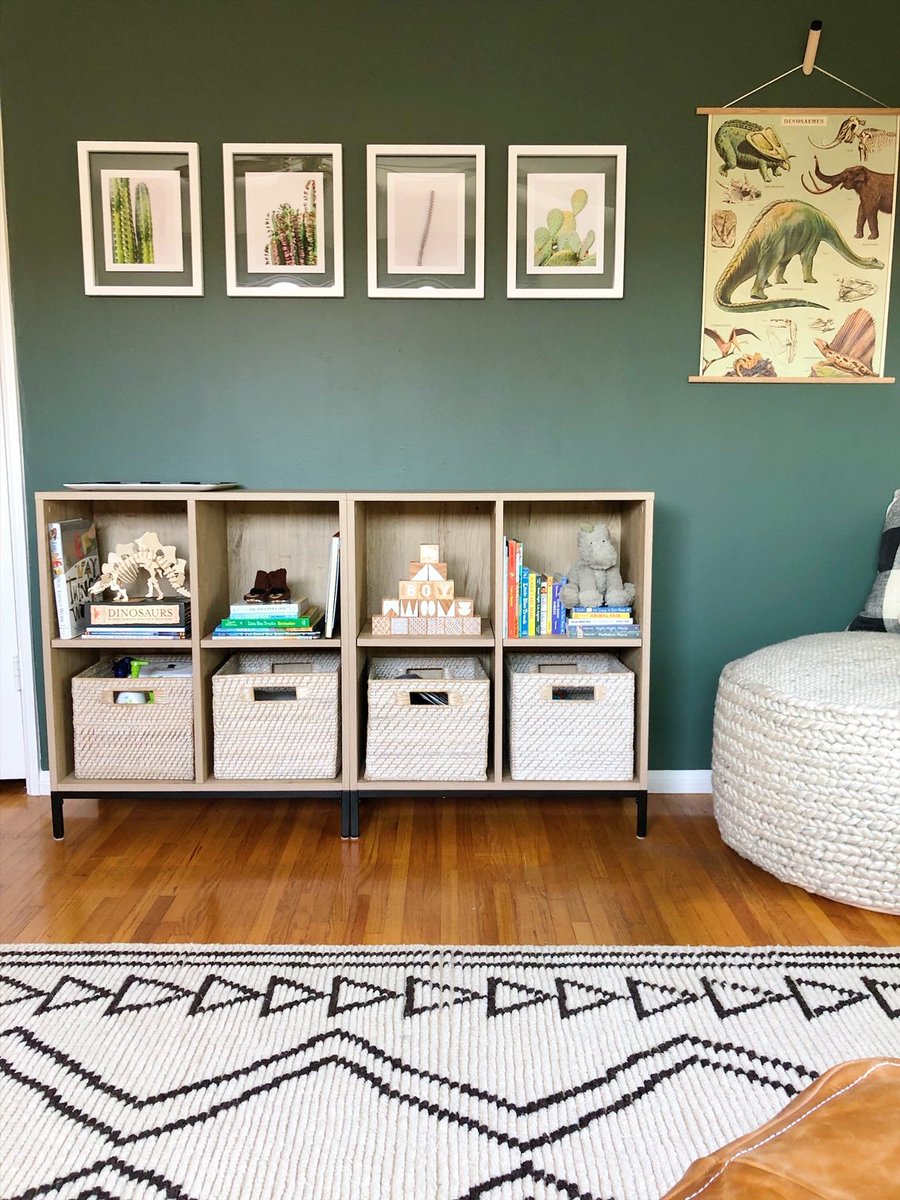 We're digging the earthy, natural vibe in this 'deserts + dinos' themed nursery! The accent wall in #PleasantHill by #ecospaints adds the perfect amount of depth and coziness to the space.