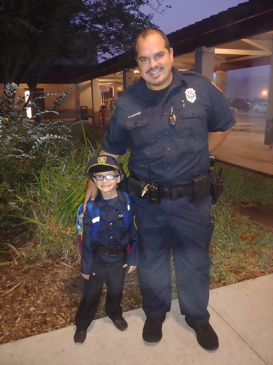 HCPSCollinsElem's tweet photo. It is Red Ribbon Week and today is “Dress for Success Day!” Our students dressed up as what they want to be when they grow up! Jace wants to be an officer, just like Officer Gonzalez! ❤️❤️❤️ #choose2be #RedRibbonWeek https://t.co/UCgs9oHWj6
