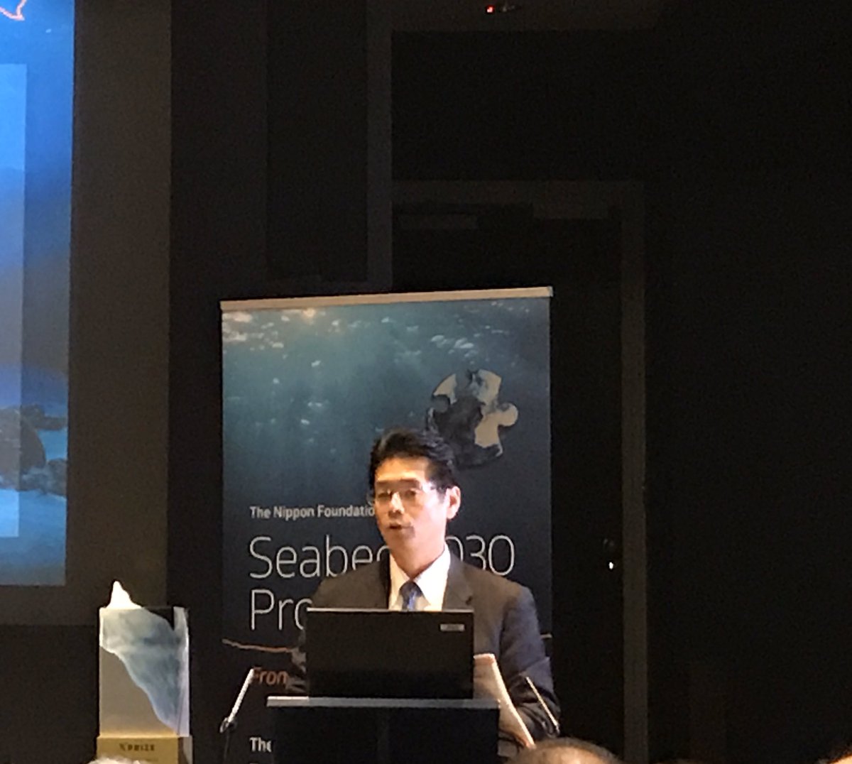 deepseadawn's tweet photo. Salute to @GEBCO_NF_Alumni winners of Ocean Discovery @xprize 🏆 at the @seabed2030 + @gebcobathymetry’s #VisiontoAction w/lovely background by Aileen Bohan of GSI+ @followtheboats Trophy presented by Mr. Mitsuyuki Unno Exec Dir of Nippon Foundation #MaptheGaps #oceandiscovered https://t.co/PwMhftVsTj