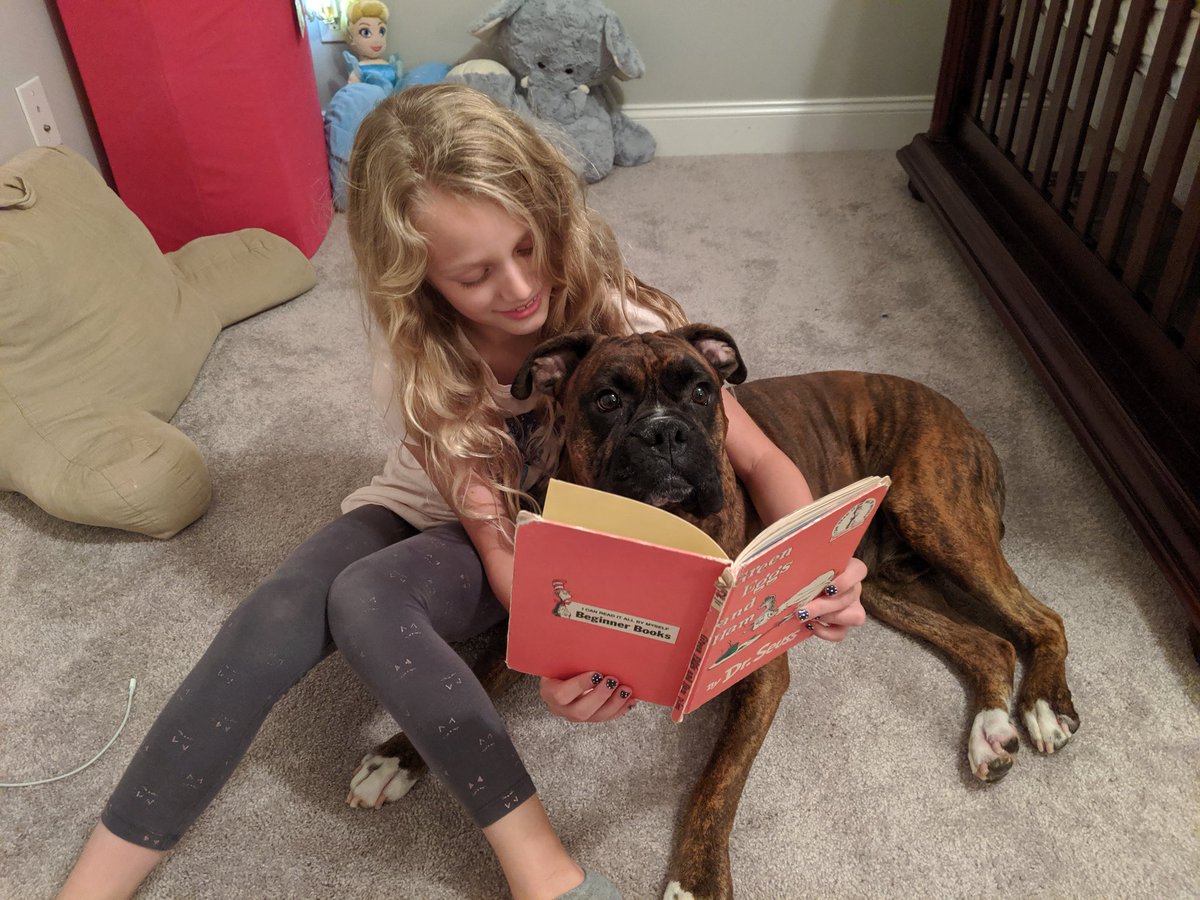 Reading to a pet is so much fun! #readingchallenge <a href="/CGETwolves/">Cedar Grove Elem.</a>