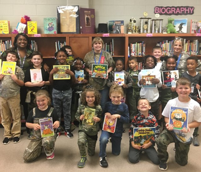 LauraMcNulty1's tweet photo. @FHES_TWEET fights against drugs wearing camo AND choosing #goodfitbooks #NewtonReads #RedRibbonWeek https://t.co/O3WirhlMju