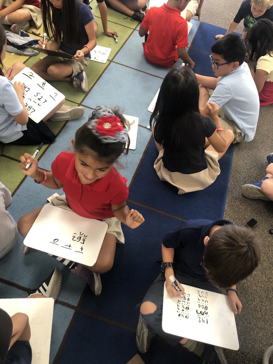 The math warm up: ‘Pizza Bagel Donut’, was a hit on their own whiteboards! It looks like they are writing in code.  <a href="/Heritage_TUSD/">Heritage Elementary</a>