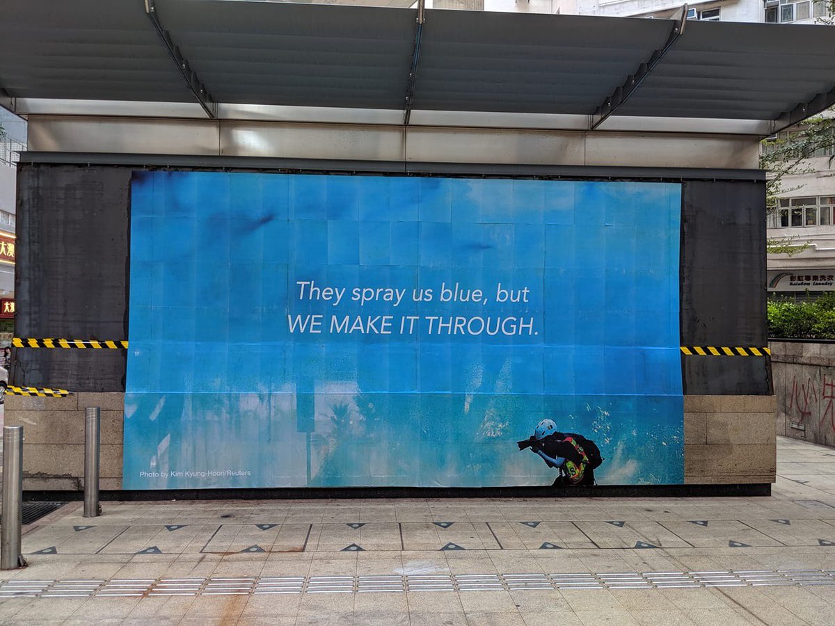 summersurfi's tweet photo. "They spray is blue, but we make it through."

香港人文宣大進化 真係以為係黨鐵廣告！！ #貼堂作品

#StandWithHongKong #watercannon #Chinazi https://t.co/QX2SZOl0XS