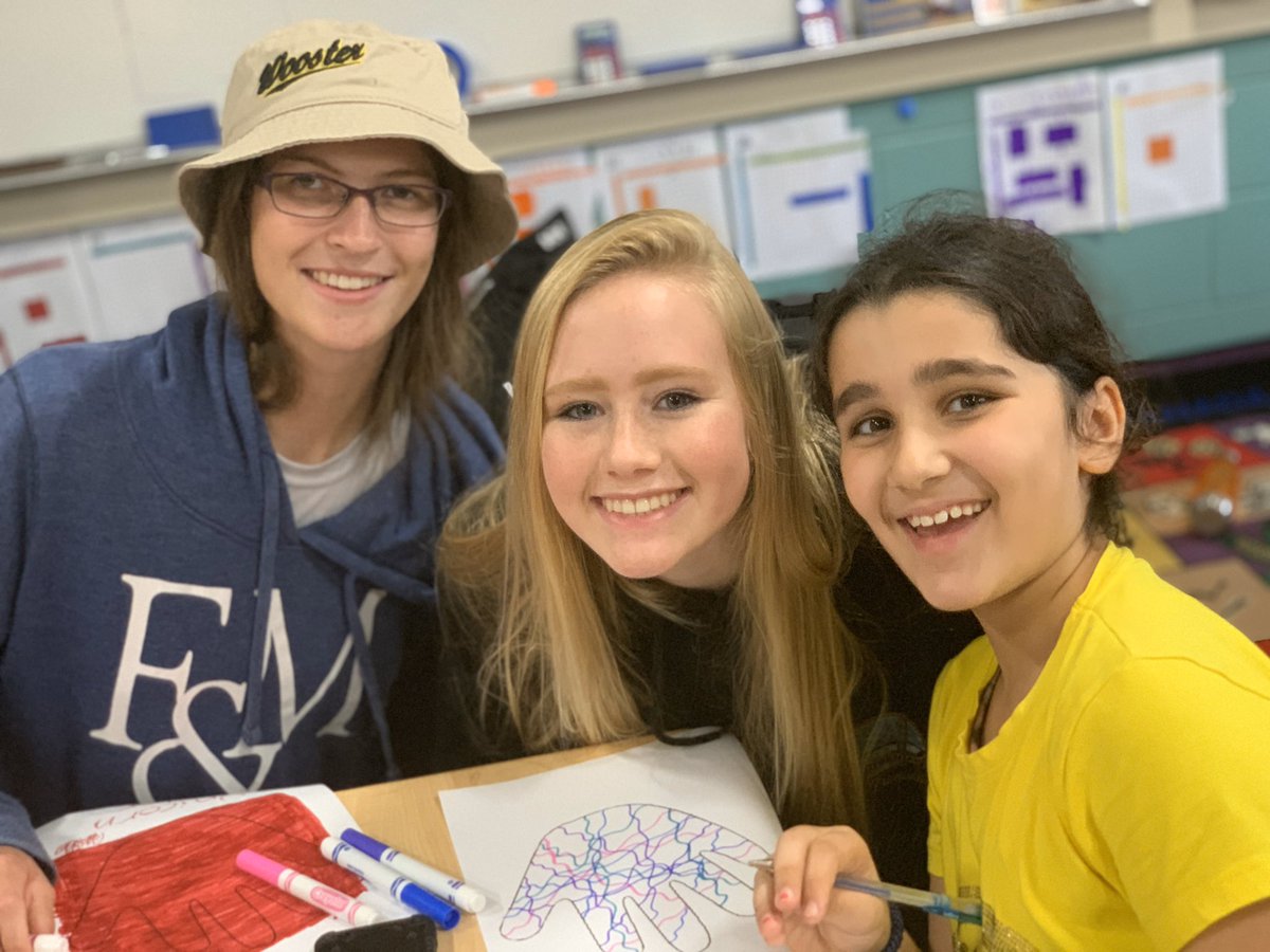 BullisSchool's tweet photo. Lower School students met their Senior buddies for the first time. It was clear the youngest bulldogs knew they were in good company. Lower and Upper School Buddies’ giant smiles brightened a grey day. #CaringChallengingCommunity #Bullis2020 #teambullis https://t.co/OKYYKE7xbv