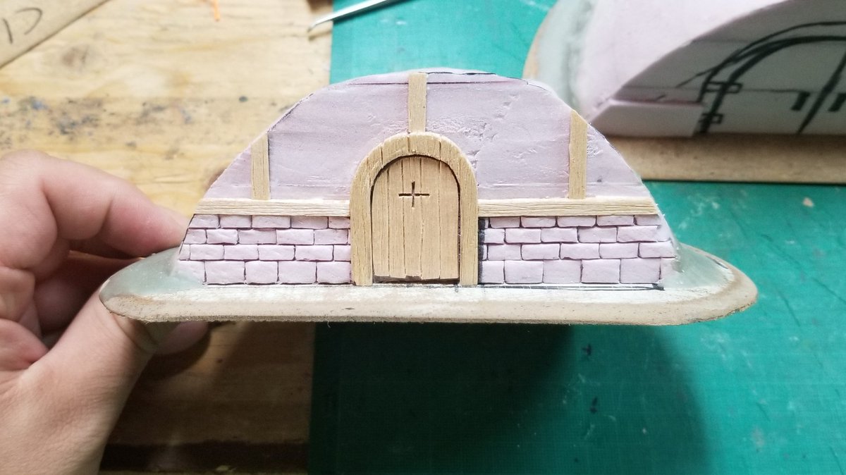 elTonioBerg's tweet photo. Almost done with the detailing on the small burrow. I still have to add the hinges, the door knob, and the roof ledge. #wip #terrain #scratchbuilt #BurrowsAndBadgers #RogueSculpts #CraftOff https://t.co/xs7JBYypl7
