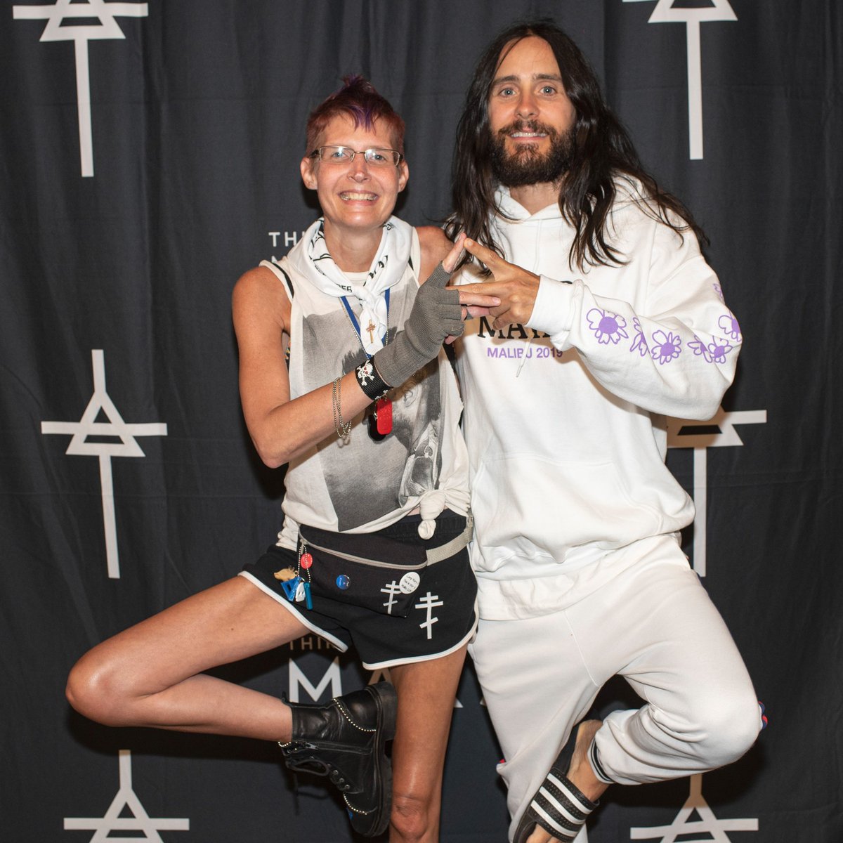 jtude's tweet image. This one of me, my #marshawk &amp;amp; @JaredLeto from @30SECONDSTOMARS @SummerCampMars 🔺💜🔺 #triadpower #iamtheechelon #livelovelaugh #livelikeadream #yesthisisacult #mamawolfjen #iamaphoenix #riselikeaphoenix #musicislife #musicislove 😍🐺😘