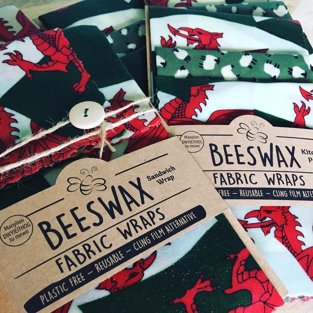 WrapsFabric's tweet photo. The welsh dragon beeswax wraps are ready! Kitchen pack £14 and sandwich wrap £7. 20% of sales between now and Christmas will go to @OrchidCancer and @cancer_wales message me to order 🏴󠁧󠁢󠁷󠁬󠁳󠁿💚@nwalestweetsuk https://t.co/fHrN8RDrYd