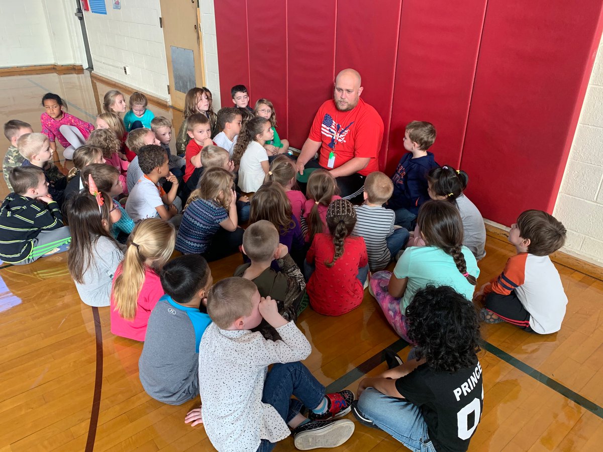 OleanWW's tweet photo. Mr. P telling us all about the life and legacy of Marv Levy and the @BuffaloBills history as inspiration for our efforts in PE class. #huskypups https://t.co/Q09KI0NMBr