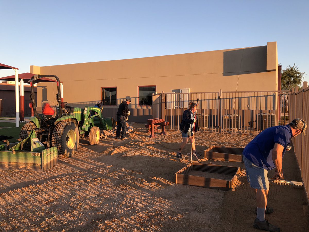 DVUSD Facilities grounds crew hard at work adding the finishing touches to our Com Ed 2’s preschool playground. #riverbed #mudkitchen @CommunityDv @DVUSD @CCBobcats