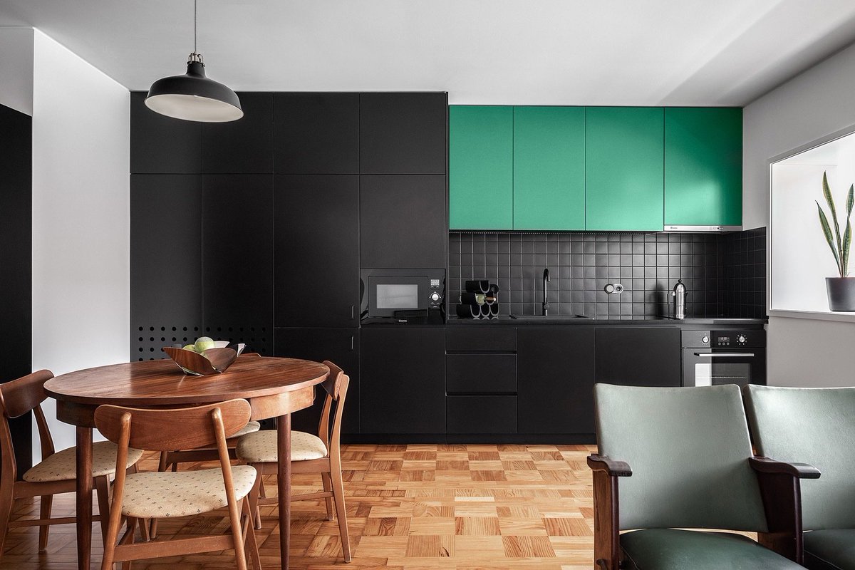 apartmentlovin's tweet photo. @HasStudio inserts black timber furniture into the 60’s-era apartment in Portugal: https://t.co/KjdecukQxg https://t.co/AjYezqTPPM
