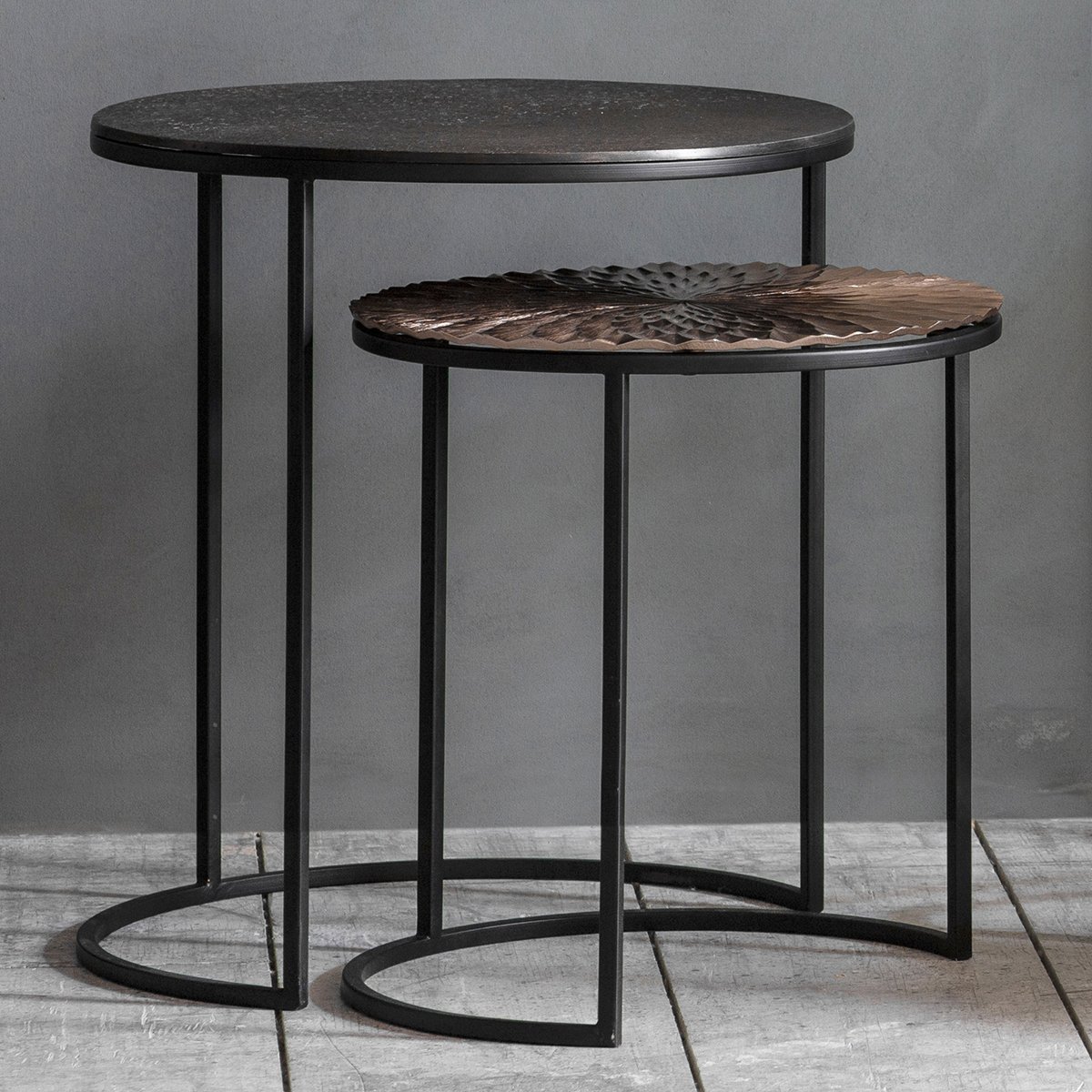 We have a wide variety of occasional tables at Loom Loft to suit every home decor.

The Limasol set of two side tables feature black metal frames with mis-matched tops, hand finished in India for a truly artisanal finish.