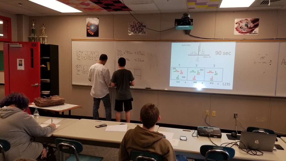 MBelisle's tweet photo. Engineers Teaching Algebra working with Algebra 1 on designing traffic signal cycles.  #hdhspride https://t.co/01yPbhI8Oq