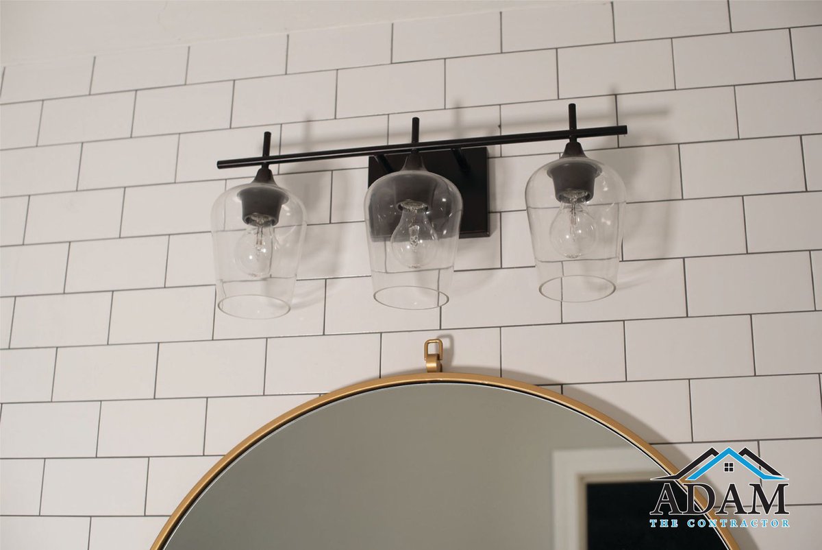 AdamContractor's tweet photo. This client wanted a rustic look with a contemporary touch. We decided together to use gray paint, white and gray shaded 12x24 tiles, chrome fixtures, a custom rustic vanity, a larger farmhouse sink and a round mirror. How do y’all think it turned out? #plano
#adamthecontractor https://t.co/IOqxpXRMk5