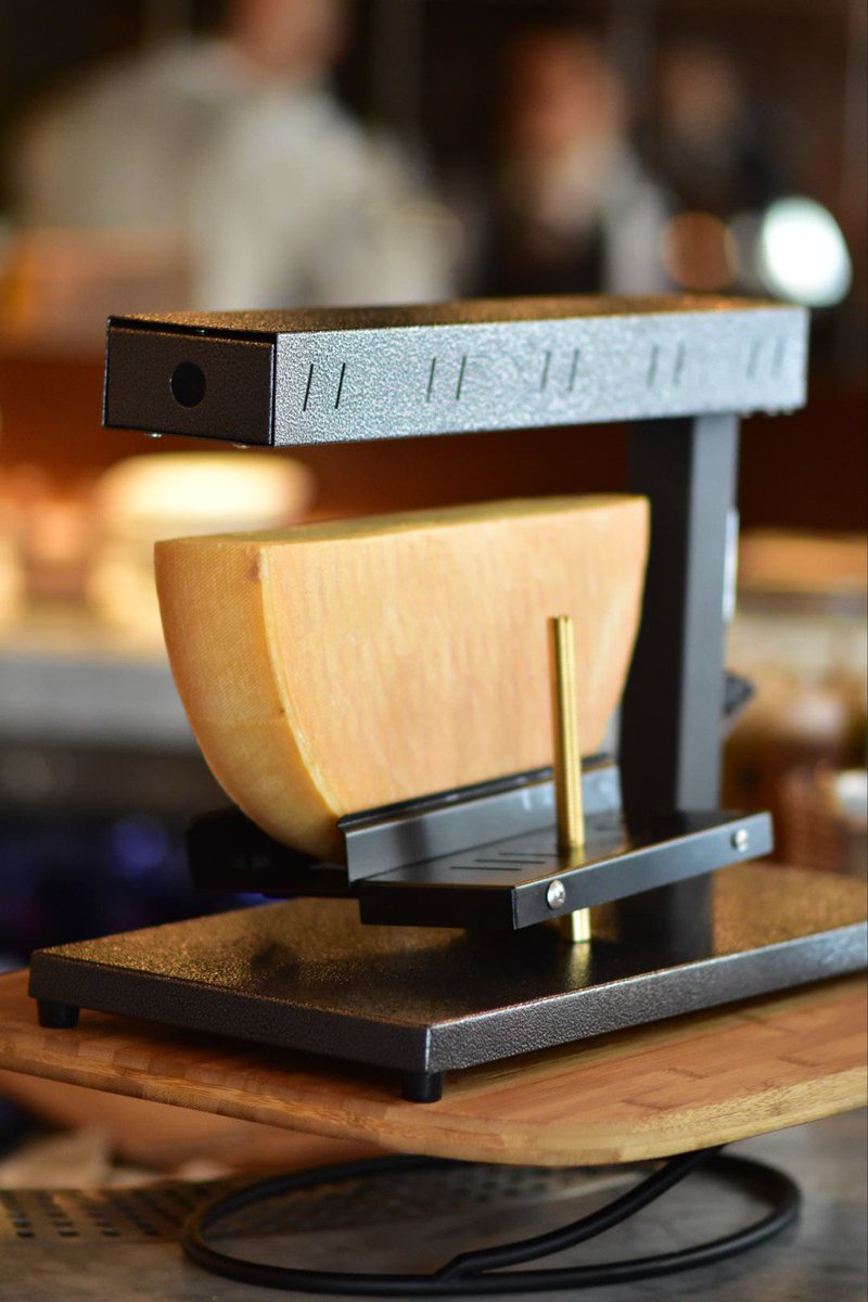 No judgement if you want to yodel with joy after trying our Swiss-style raclette, served hot and melted over baby potatoes.  It's just one of the delicious options available at our brand new charcuterie and cheese bar.