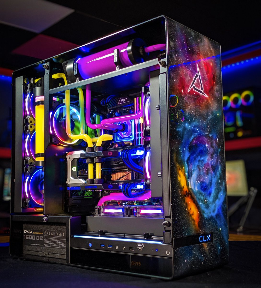 CLXGaming's tweet image. This custom galaxy themed system is on the way to its new home. 

It has an @AMDGaming Ryzen 9 3900X and dual @NVIDIAGeForce RTX 2080Ti. 😍

#CLXGaming #evokethegods #custompcs