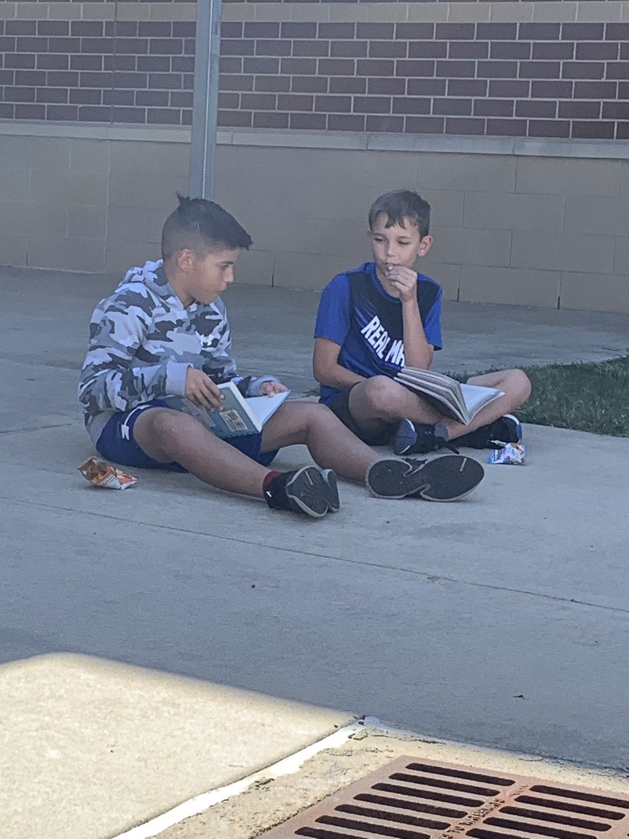MKarsteter's tweet photo. After working hard all morning on our CBA, we are enjoying reading outside!   The weather is BEAUTIFUL! https://t.co/s8F2LHyeGs