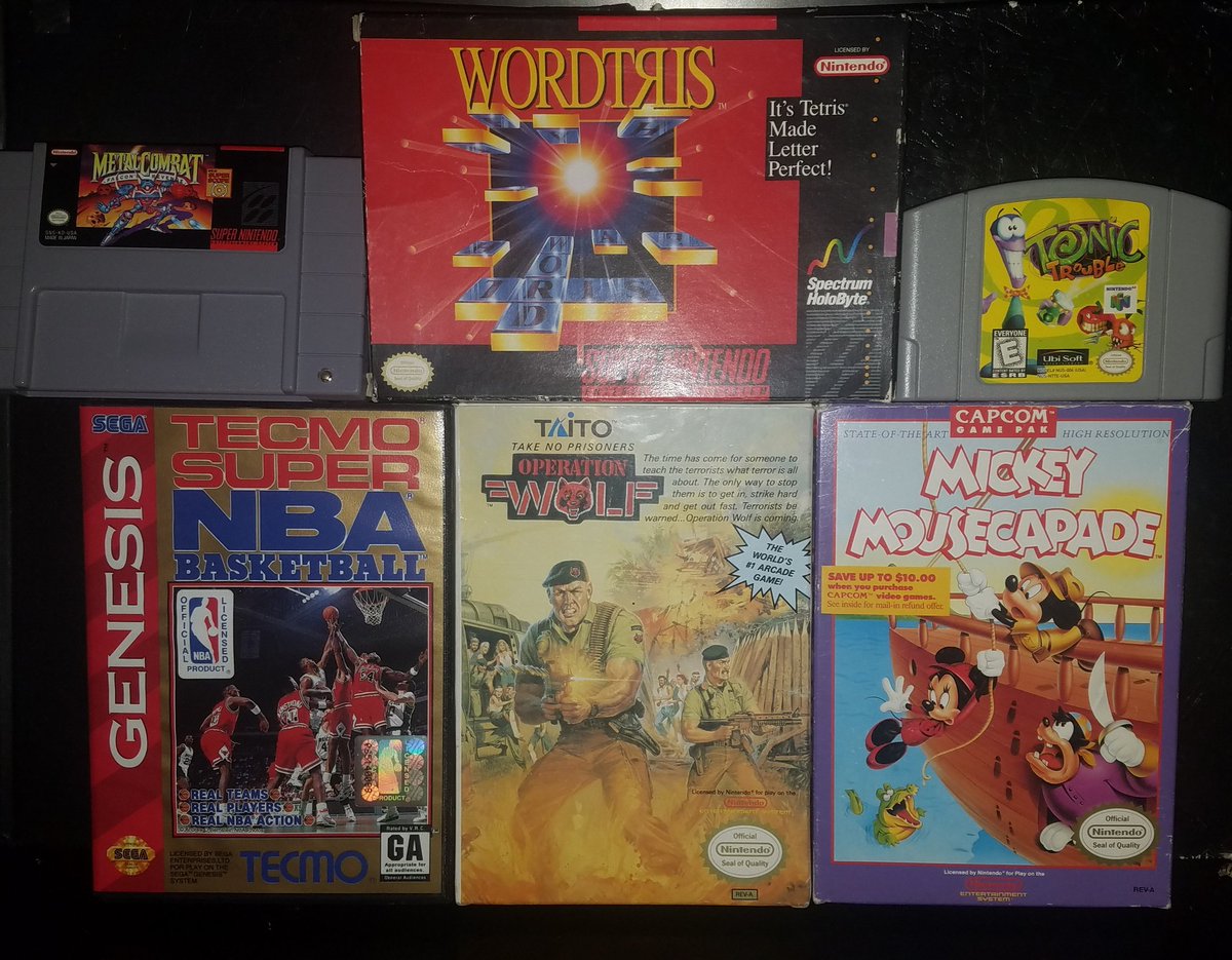 UMKShock's tweet photo. #Englishtown #fleamarket pickups from the last couple weeks. #retrogaming #cartcollecting #cartridges #8bit #16bit #nintendo #sega #genesis #nes #snes #n64 #metalcombat #wordtris #tecmo #supernbabasketball #operationwolf #mickey #mousecapade #capcom #taito #ubisoft #tonictrouble https://t.co/nnVBAtxTzU