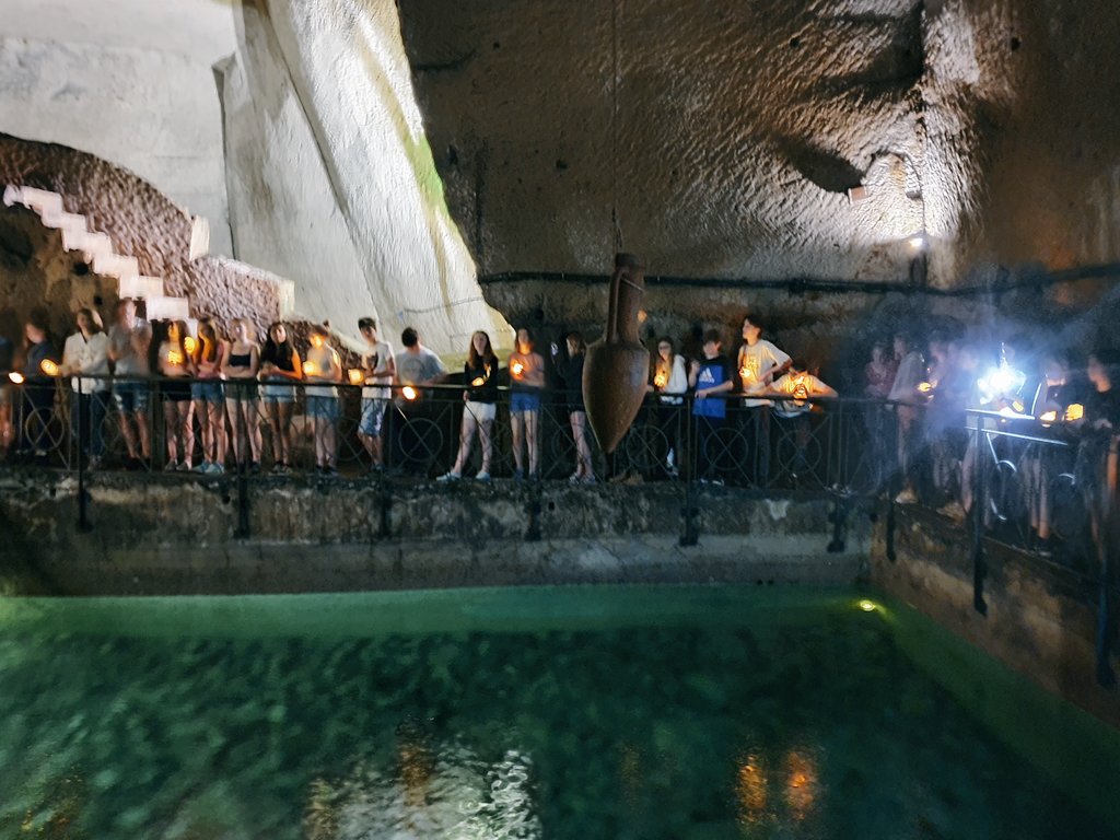 KEVICC's tweet photo. Our first stop of the day was a tour of Naples Underground. We squeezed through tiny gaps and overcame claustrophobia to discover the subterranean life of Napoli! This included coming face-to-face with an unexploded American bomb, dropped on Naples during WWII! #WhenInNaples https://t.co/jGSMH9JZuk