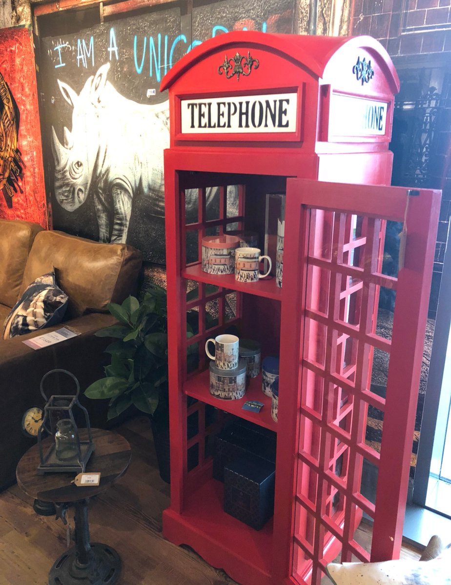 A wonderfully quirky piece of furniture, this two shelf cabinet is styled along the lines of an old style telephone box. Painted in the bright red of these icons of the British high street it really is a stand out piece and will be a real talking point.