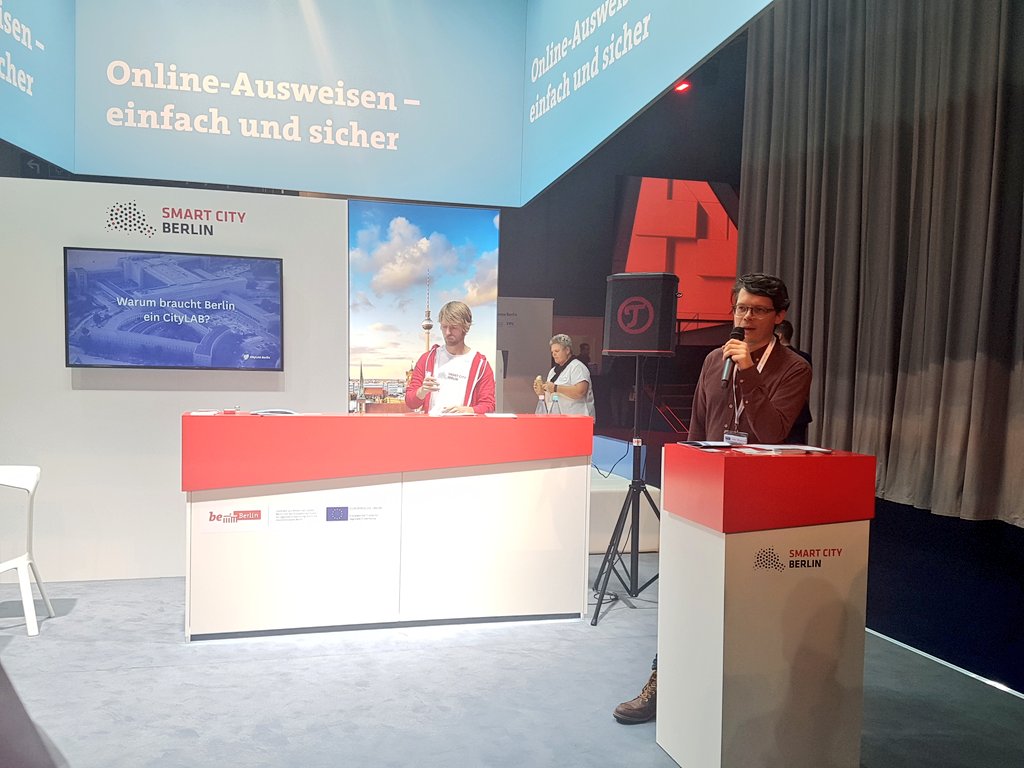 toriboeck's tweet photo. Happening now: @bnjmnsbl, head of @citylabberlin, is at the Smart City Berlin booth presenting on the CityLAB. Want to know more? Visit: https://t.co/yK4Md4z0tK #SCCon2019 #sccon19 https://t.co/hacYoSoz1Z