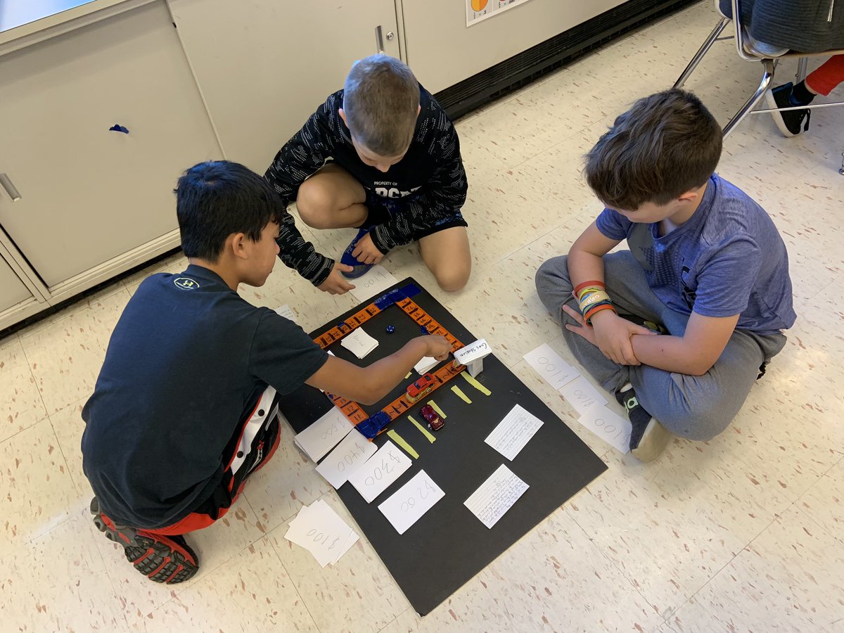 NATigerTech's tweet photo. STEAMing it up in math using student made Division Board games to review skills. Getting peer feedback before they redesign/improve and send them to 4th grade. #nasdlearns https://t.co/8LlJBHjuvZ