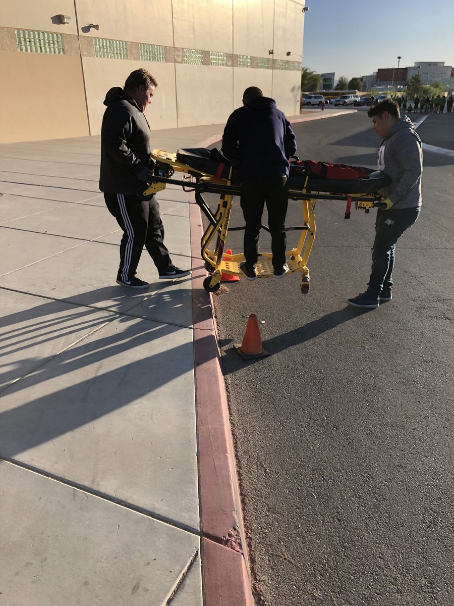 Battecm's tweet image. Stretcher practice over uneven pavement with 3rd year! #RealityBasedTraining