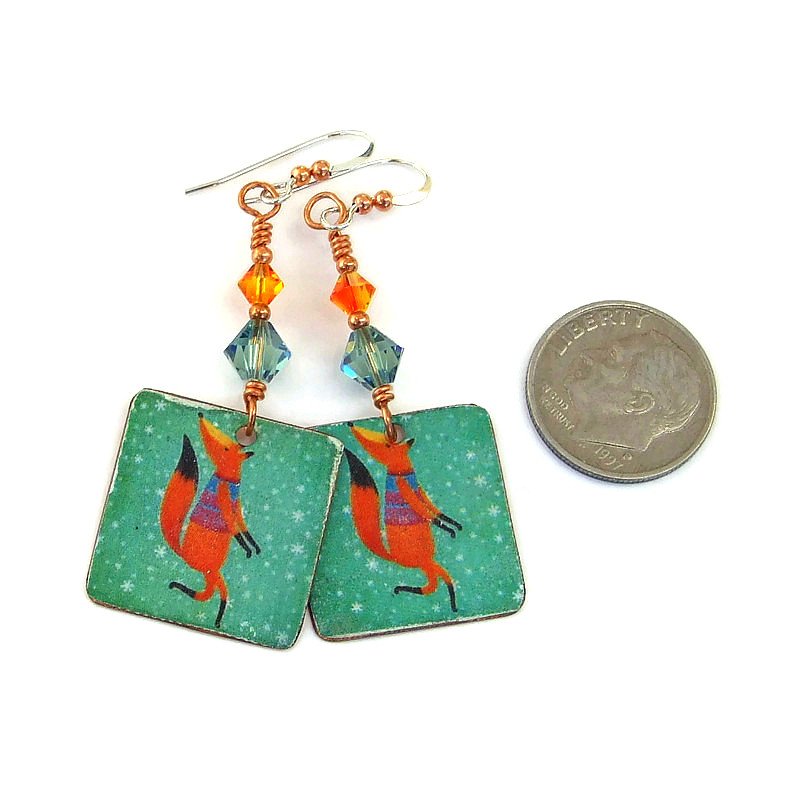 ShadowDogDesign's tweet photo. New!  Fun &amp; whimsical frolicking fox in snow flurries faux tin earrings w/ sparkling Swarovski earrings! https://t.co/Ej9SFfiACm via @ShadowDogDesign #Handmade #Christmas #FoxEarrings https://t.co/eUx9kGiFbM