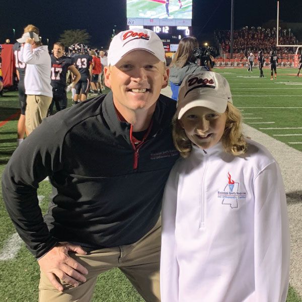 MissSportsMed's tweet photo. Dr. Jason Craft had a special helper at last week’s football game! Dr. Craft is a hip and knee specialist at #MSSportsMed, and one of our many specialists on the sidelines each week keeping our student athletes safe.
#ExpectExcellence #CompassionateOrtho #WeSpecializeForYou https://t.co/BCrpz952op