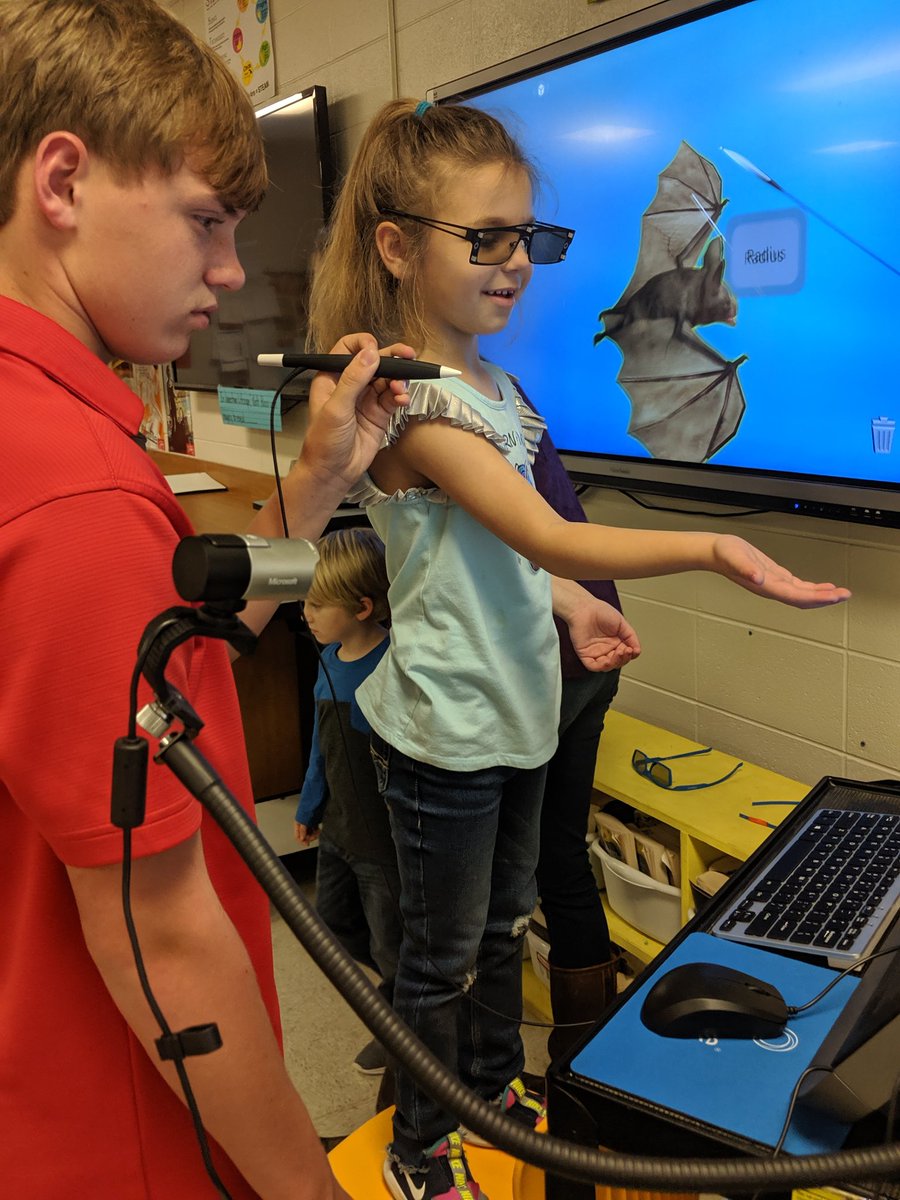 kwhiteFHS's tweet photo. @TCBOE_FHS  8 grade ss helped kinders use @zSpace  to explore vampire bats through augmented and virtual reality. They loved it! @TCBOE #Leadersofthepack #handson #kidsteachingkids @stephbroox https://t.co/mZXriwHtE7