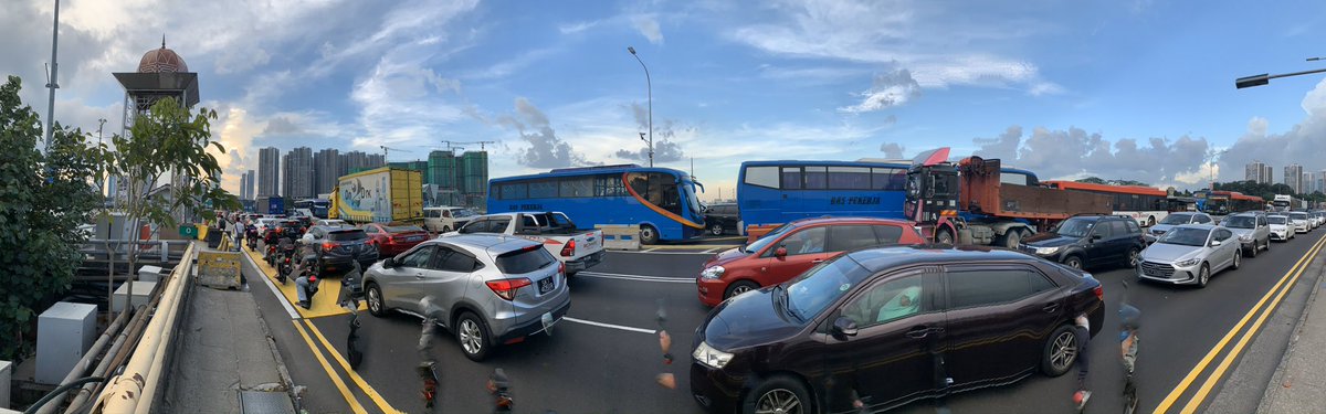 The Singapore Woodlands – Johor Bahru Causeway. Literally, it is no man’s land as one standing here is in neither of the two countries. Official Singapore-Malaysia border is where the dome is. Notice the distance marker set to “0” for Malaysia. Traffic was really bad. I walked! &ndash; bei  Woodlands Checkpoint (Causeway)