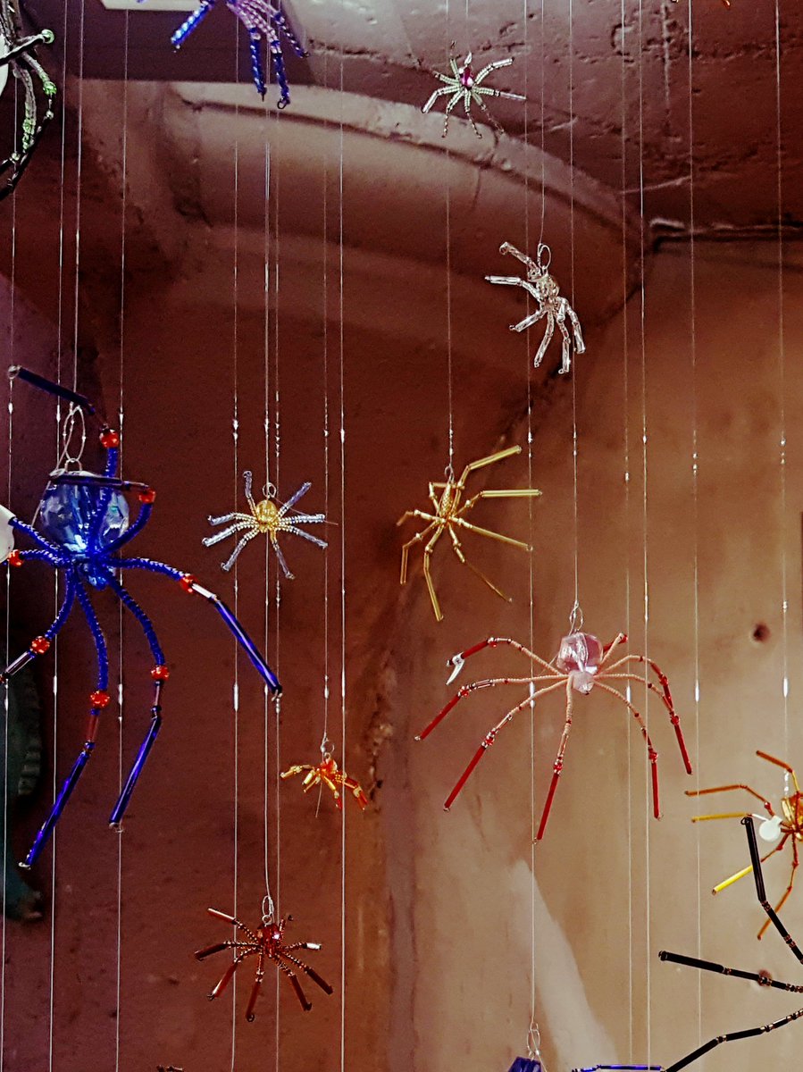 CALSRobertsLib's tweet photo. A spooky installation of hand-beaded spiders by Red Star.
.
.
.
#christmasspiders #spiders
#art #artgallery #dowtownlr #littlerock #calslibraries #galleriesatlibrarysquare
#littlerockarkansas #artoftheday #arkansasart #supportlocalartists #buylocal #shoplocal https://t.co/XUUDu9hCTi
