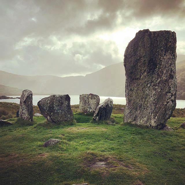 TravelHags's tweet photo. URAGH STONE CIRCLE. 4000+ years ago, inhabitants of the Beara Peninsula in Southern Ireland brought these stones to a hillock between two lakes in a region surrounded by mountains. The tallest stone is over 10 feet high. Who knows why? #thinplaces #uragh… https://t.co/yP97E6wnsQ https://t.co/aq9EnR4Fct