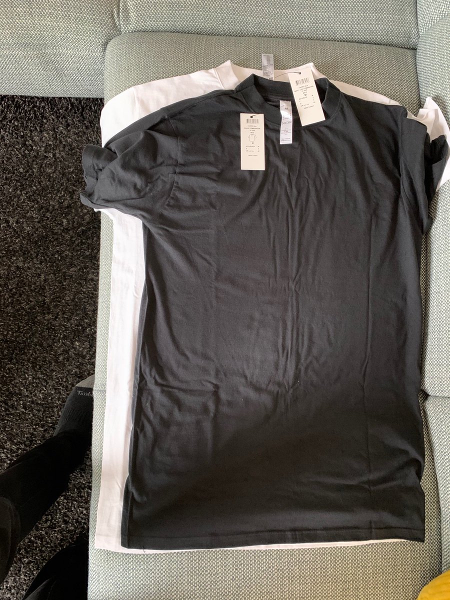 keithpemberton's tweet photo. @Zalando two mediums?! Exactly the same shirt in black and white but look at the size difference? Cheap quality and terrible sizing!!!!! https://t.co/TZXmpRi9s7