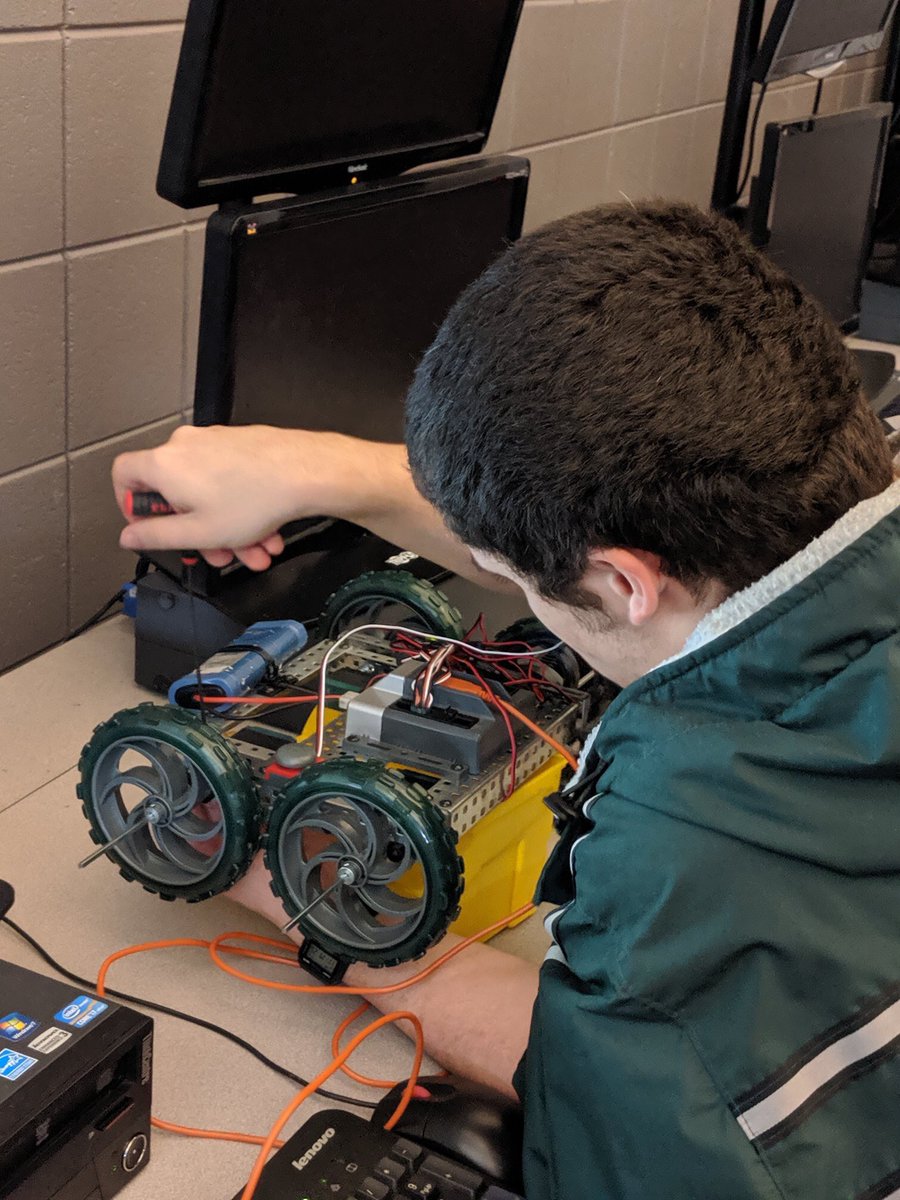 OpelikaCTE's tweet image. Students in Computer Integrated Manufacturing have learned to program in RobotC and are studying the use of Automated Guided Vehicles in manufacturing. They have built small robots and are composing and testing their code to see if it can accomplish a task without a human driver.