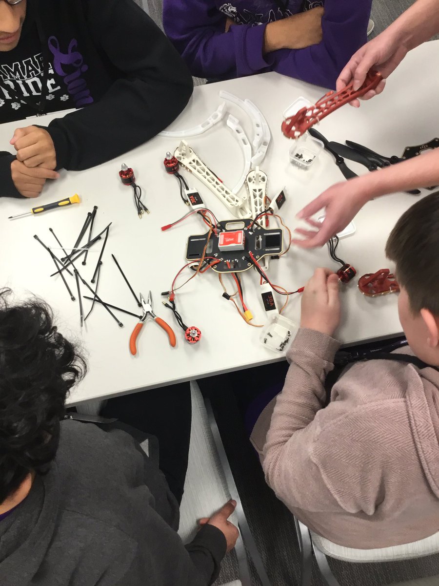 CoachKVasquez's tweet photo. Enjoying our time at the #ntxstem STEM GOES RED thanks to @AHA_Dallas. Building a drone! #iisd #ourkids https://t.co/ZVlFSbe7Ld