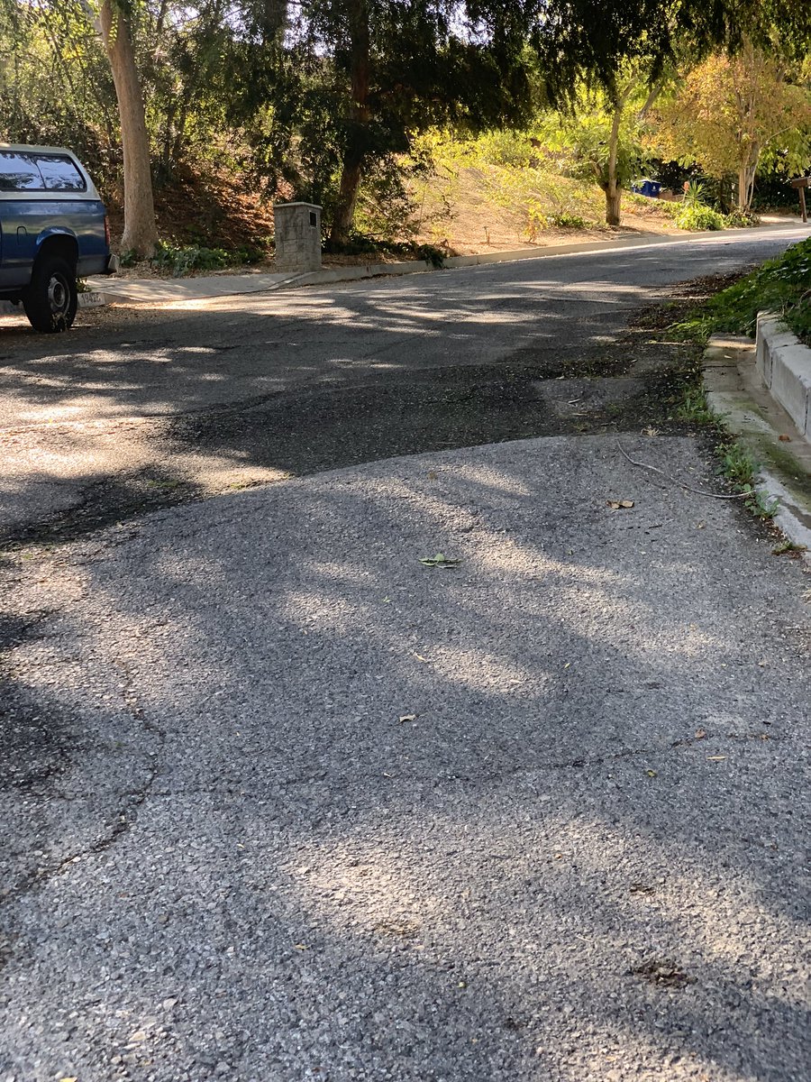 KathleenLMP's tweet photo. @BobBlumenfield these are the photos I emailed you about.  The street is a health and safety hazard. How do we get it resurfaced before someone is hospitalized or worse?  Many have already been injured.  Thank you. https://t.co/g2x0jBNRX6
