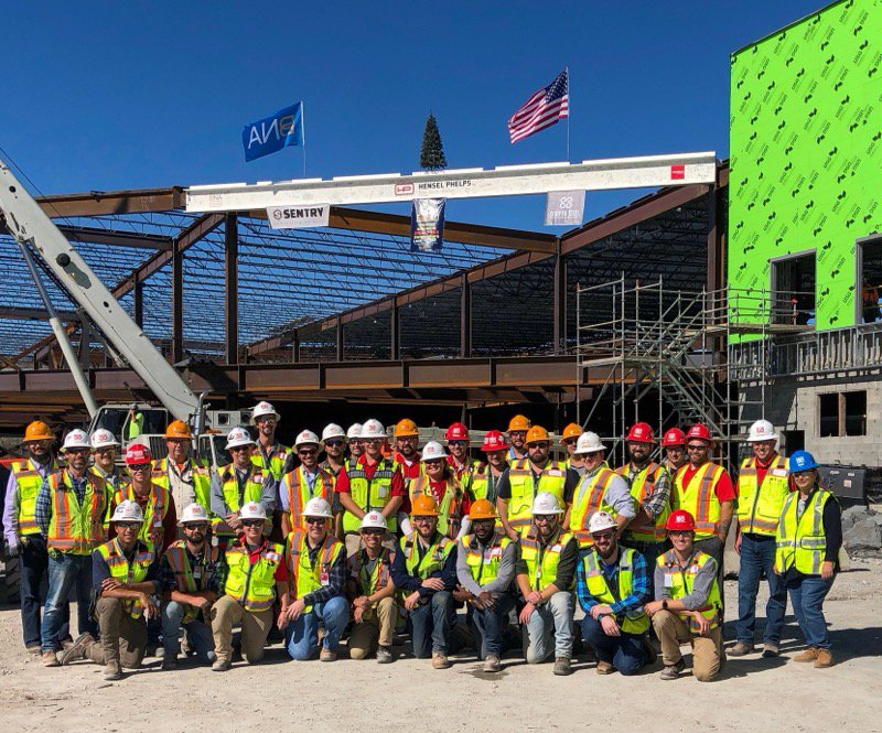 HenselPhelps's tweet photo. The @Fly_Nashville Concourse D and Terminal Wings project with @FentressArch held a topping out celebration with 500 of their closest friends! The crowd enjoyed fried chicken and amazing giveaways for our trade partners. https://t.co/ZCboM8K30A