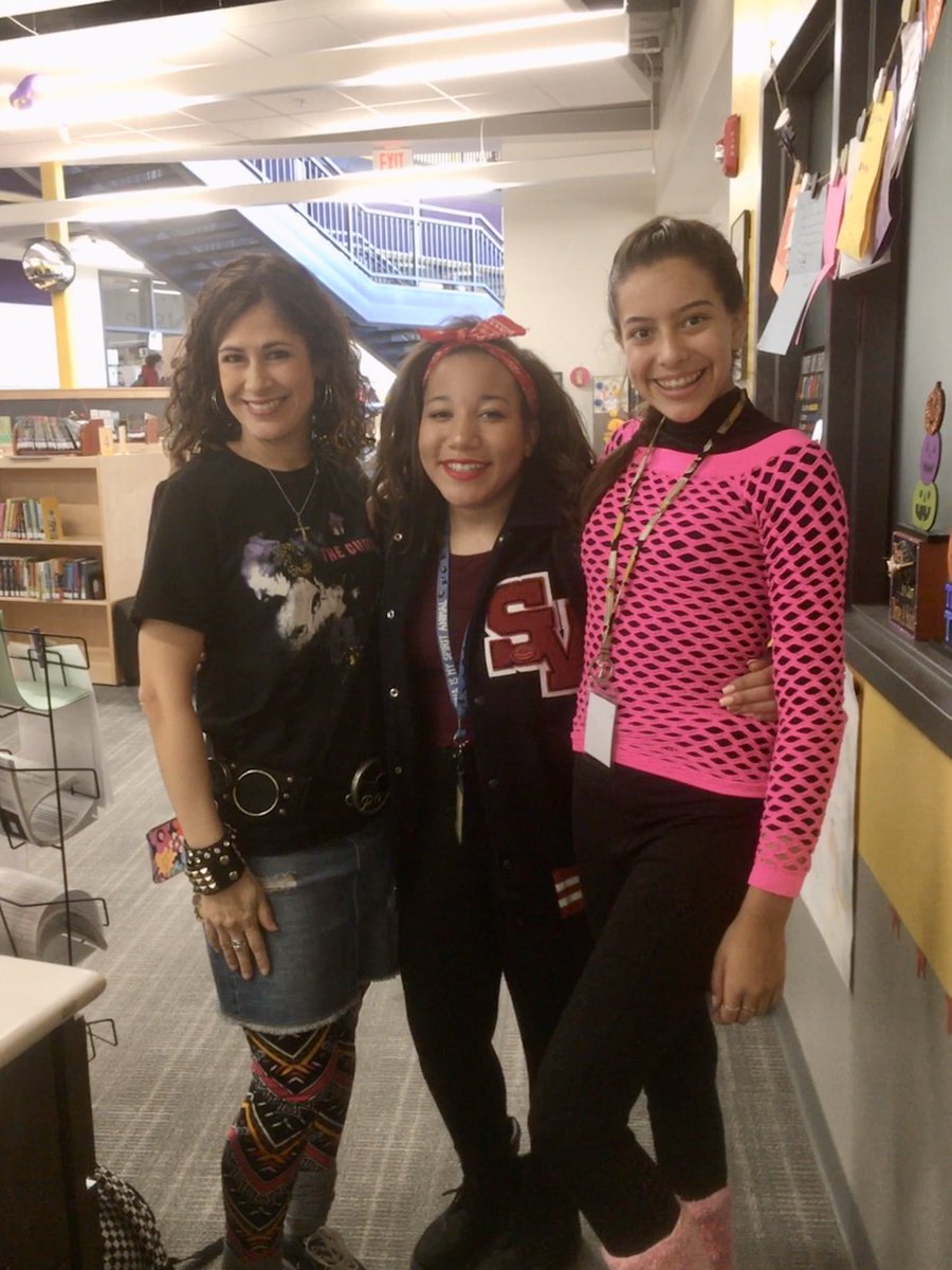 PieperMSLibrary's tweet photo. Such a fun week at @PrmsVipers ! Rocking out to the 80s with my righteously rad aides for #RedRibbonWeek2019 and spooky story retellings with my 7th grade ELA classes! #prmsreads https://t.co/fbzGkKKviq