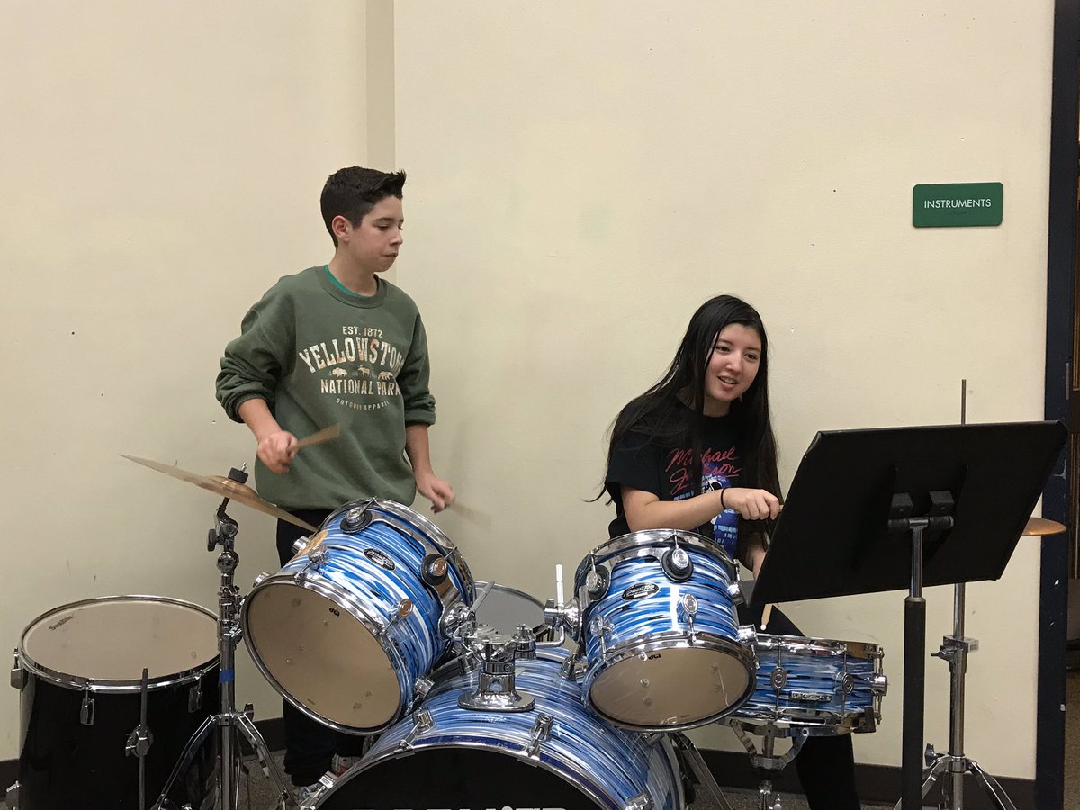 EvergreenMiddle's tweet photo. Mix-it-up Friday:   To go along with @eagles_ems and the community-building we had planned for today, the students became teachers.    8th graders had to teach each other a different instrument (sanitized, of course.). https://t.co/sRw0EcV7vR