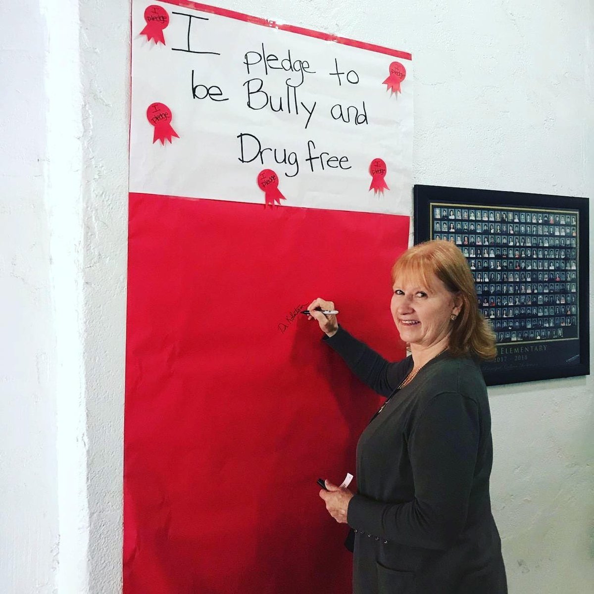 Dr. Robertson signing the Anti-Drug and Bullying Pledge on Red Ribbon Week at Somis School!