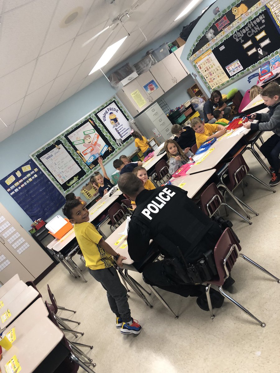 There seems to be a new student in kindergarten! We ❤️ visits from Officer Rogers!