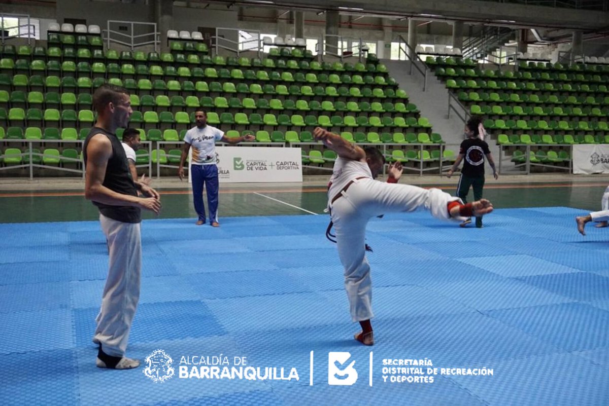 SecdeportesBAQ's tweet photo. En el Palacio de Combate Sugar Baby Rojas se lleva a cabo el  1er Workshop Internacional de Capoeira 'Perto do Mar'. Este sábado, las actividades inician desde las 10 de la mañana. Ingreso gratis. #CapitalDeportiva #DeporteParaTodos #KillaCompite https://t.co/OGYu1JQmhR